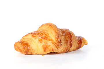 Croissant on a white background, classic French bakery specialty