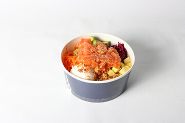 Salmon poke bowl in a studio setting