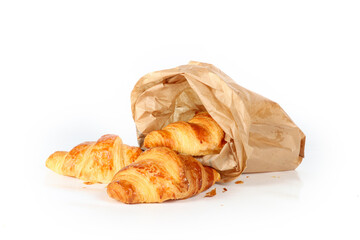 Bag of French bakery croissants on a white background