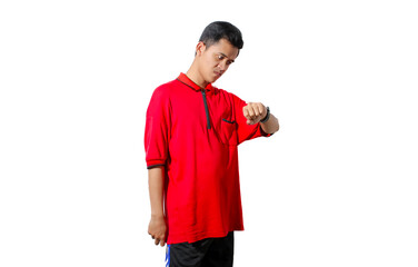 Asian man looking at digital watch worn on his wrist, isolated on white background