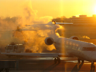 Winter Air Travel Airport Tarmac Safety Deicing Truck Spraying Plane