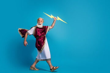 Photo of ancient aristocrat mythological god powerful nature holdthunderbolt strike hit isolated on...