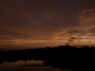 orange sky at sunset with abstract clouds