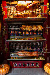 Asador de pollos.