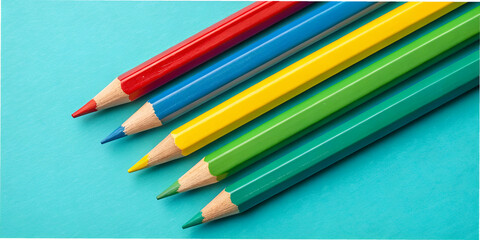 Fototapeta premium A vibrant arrangement of colored pencils in red, yellow, green, and blue against a teal background, showcasing their sharp tips and smooth design.