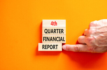 4th quarter financial report symbol. Concept words 4th quarter financial report on beautiful wooden blocks. Beautiful orange background. Business 4th quarter financial report concept. Copy space.
