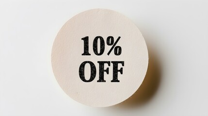Black '10% OFF' Text on a White Round Paper Note. White Background with Copy Space