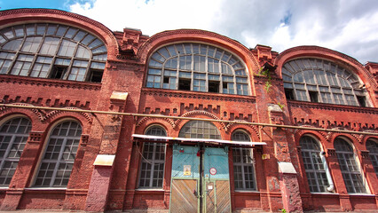 The old factory bricks building with windows and gates timelapse hyperlapse