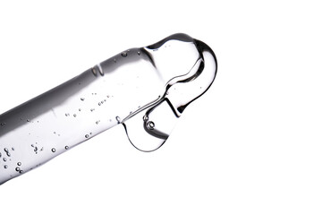 Dropper pipette with delicious serum with bubbles close-up.
