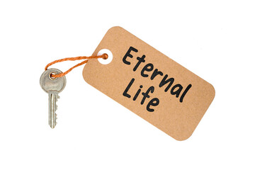 Key to Eternal Life Concept Idea Metaphor Text on Brown Paper Label with Door Key Isolated on White Background