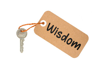 Key to Wisdom Concept Idea Metaphor Text on Brown Paper Label with Door Key Isolated on White Background