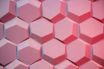 The image is a close up of a red and white patterned wall