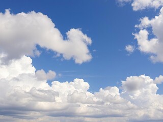 Obraz premium A stunning blue sky with thick cumulus clouds scattered across the sky, cloud formations, blue sky, textured surfaces