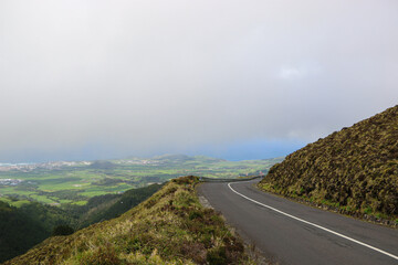 road in the mountains with top view of Sao Miguel island