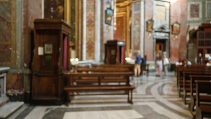 Blurred church interior with pews and indistinct people create a serene and contemplative religious...