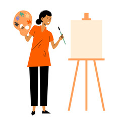 Female artist paints. Artist holds brush and palette standing in workshop with easels to create artworks. Profession, art, work, creativity concept. Young happy smiling woman girl artist. Creative