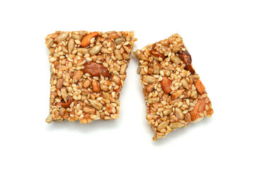Honey bars with sunflower seeds on a white background