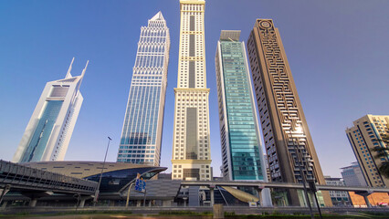 Obraz premium Skyscrapers at the Sheikh Zayed Road in Dubai timelapse hyperlapse