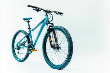 Fototapeta premium Teal mountain bike on white background.