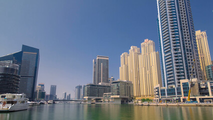 Dubai Marina skyscrapers. View from embankment timelapse hyperlapse