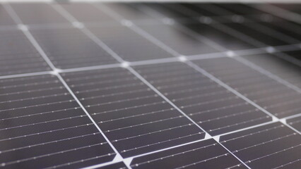 Close-up of modern photovoltaic solar battery panels. Rows of sustainable energy solar panels...
