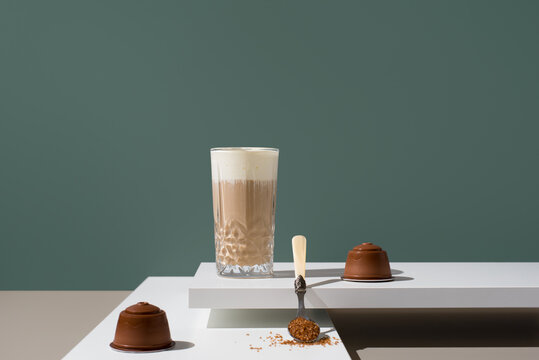 Glass of coffee with milk cream and brown sugar theme