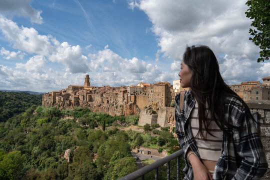 Scenic view of Pitigliano cliffs with lush landscape and cloudy sky