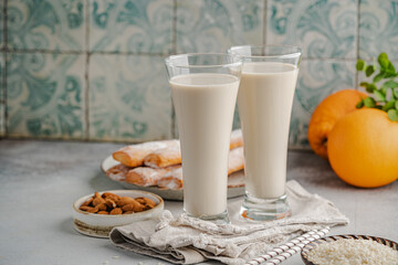 Typical Valencian products Fartons, Refreshing cold drink Horchata, rice and oranges. Spain food from region Valencia.