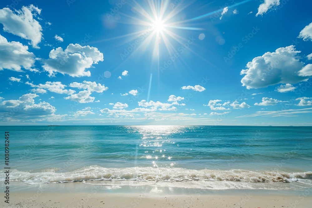 Wall mural a serene beach scene with clear blue water and white sand. a bright sun shines in a blue sky with sc