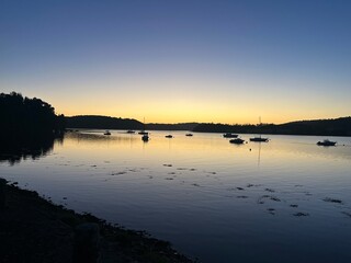 Sunset over a river boats Tregarvan Finist&egrave;re Bretagne France
