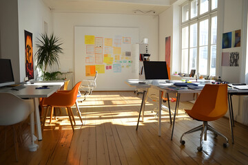 A bright workspace with colorful wall art and ergonomic furniture