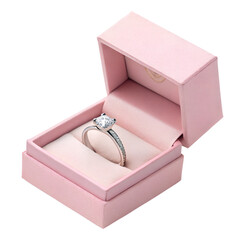 Elegant diamond engagement ring in a soft pink velvet box, symbolizing love and commitment.