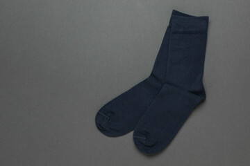 Dark Blue Crew Socks on Gray Background for Minimalist Fashion and Apparel Designs