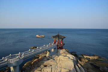 Yeonggeumjeong Pavilion in Sokcho, Korea, observation point on the rocky shore, picturesque tourist...