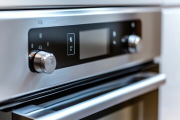 Obraz premium Stainless steel oven with digital display.