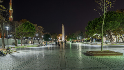 Obelisk of Theodosius with hieroglyphs in Sultanahmet Square night timelapse hyperlapse, Istanbul,...