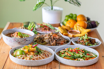 A variety of Tai Yai food is served on the table inside the restaurant and Tai Yai food is considered healthy because most of the ingredients are from beans and vegetables it is not heavily seasoned.