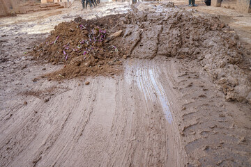 Pile of mud in the street, in the days of the cleaning of Paiporta, in the reconstruction of the...