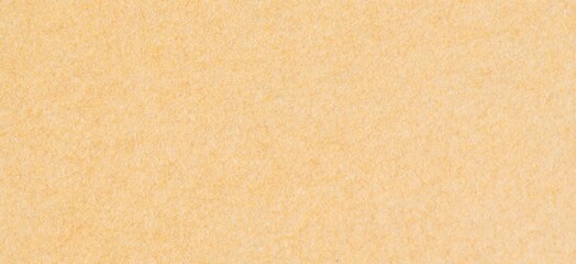 A seamless beige textured background, perfect for various design projects, offering a warm and...