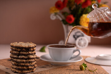 cookie, drink, newspaper, cup, dish, flower, beverage, home, saucer, relaxation, tea, baked, teapot, background, teacup, decorative, interior, element