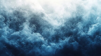 A dramatic sky filled with dark and light clouds, creating a stunning abstract appearance. The blue tones add depth to the overall composition.