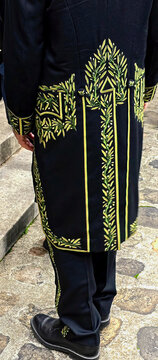 The traditional pattern of olive leaves on the ceremonial outfit of the French Academy of Science members.
