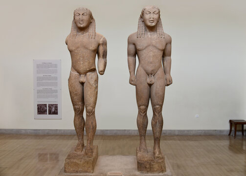 DELPHI, GREECE - MARCH 11, 2022: Kleobis and Biton, two Archaic Greek Kouros brothers from Argos, inside Delphi Archaeological Museum. Delphi, Boeotia, Greece, Europe