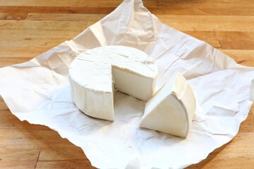 Vegan cheese. Coconut camembert. Dairy-free plant-based cheese analogue.