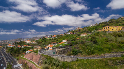 View from the mountain over the rooftops from cable car on Madeira timelapse hyperlapse.