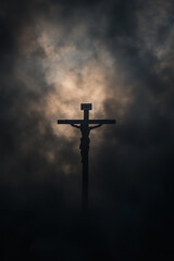 Naklejka premium A Solemn Crucifixion Surrounded by Shadows in a Darkened Sky