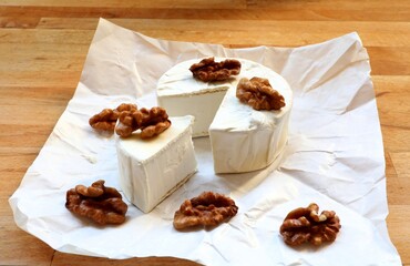 Vegan cheese. Coconut camembert. Dairy-free plant-based cheese analogue.