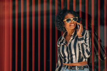 woman on the street talking on the mobile phone