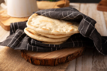 Bazlama. Turkish flatbread whose main ingredients are wheat flour, yeast, water and salt, delicious...