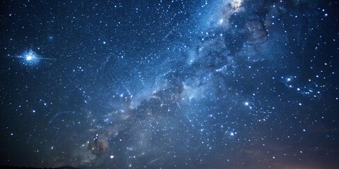 The night sky is filled with an array of twinkling stars in shades of blue and white, astronomy, dark blue, space